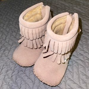 Size 3 fringe leather moccasin boot.